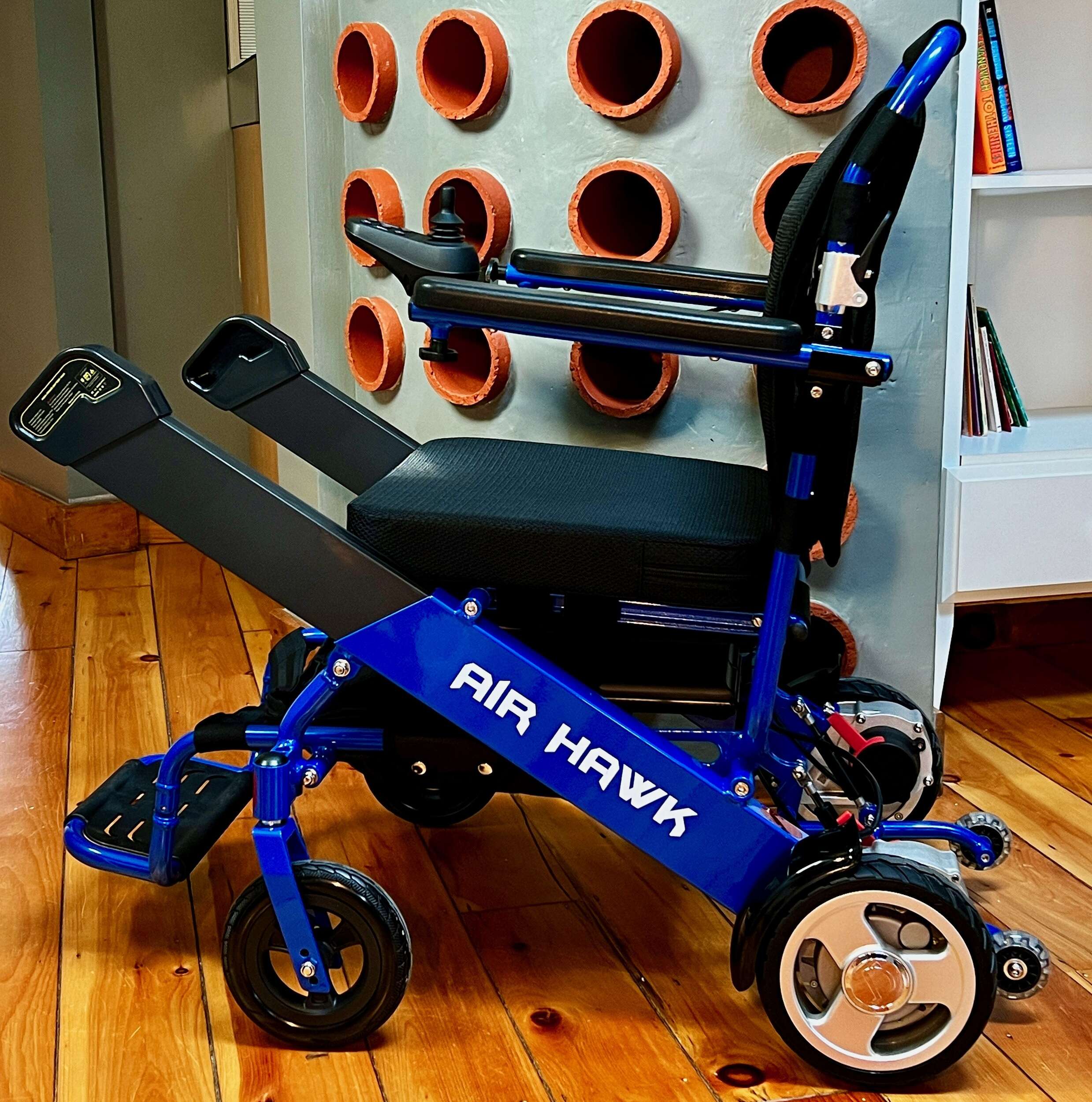 https://quicknmobile.com/wp-content/uploads/2023/05/Blue-Air-Hawk-Wheelchair-in-frame-batteries-2478x2500.jpeg