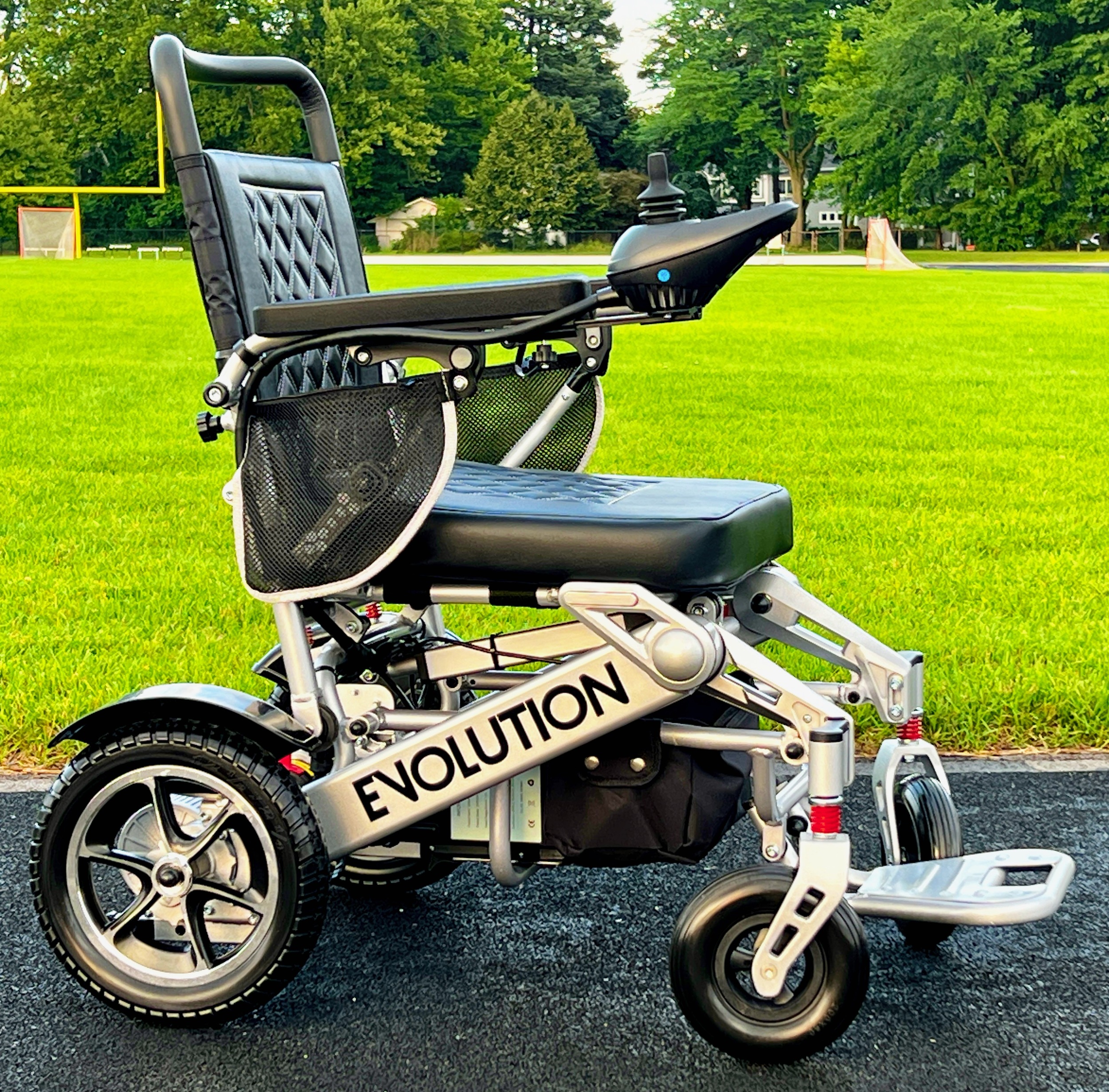 The Evolution Automatically Folding Remote Control Power Wheelchair